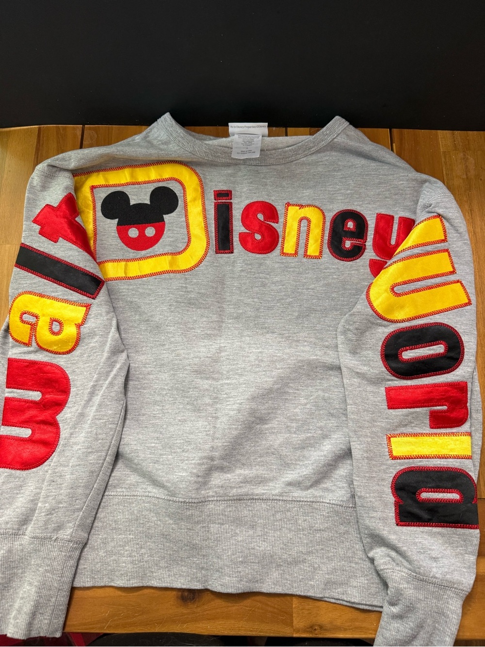 Disney Gray Crewneck Sweatshirt with Red & Yellow Appliqué